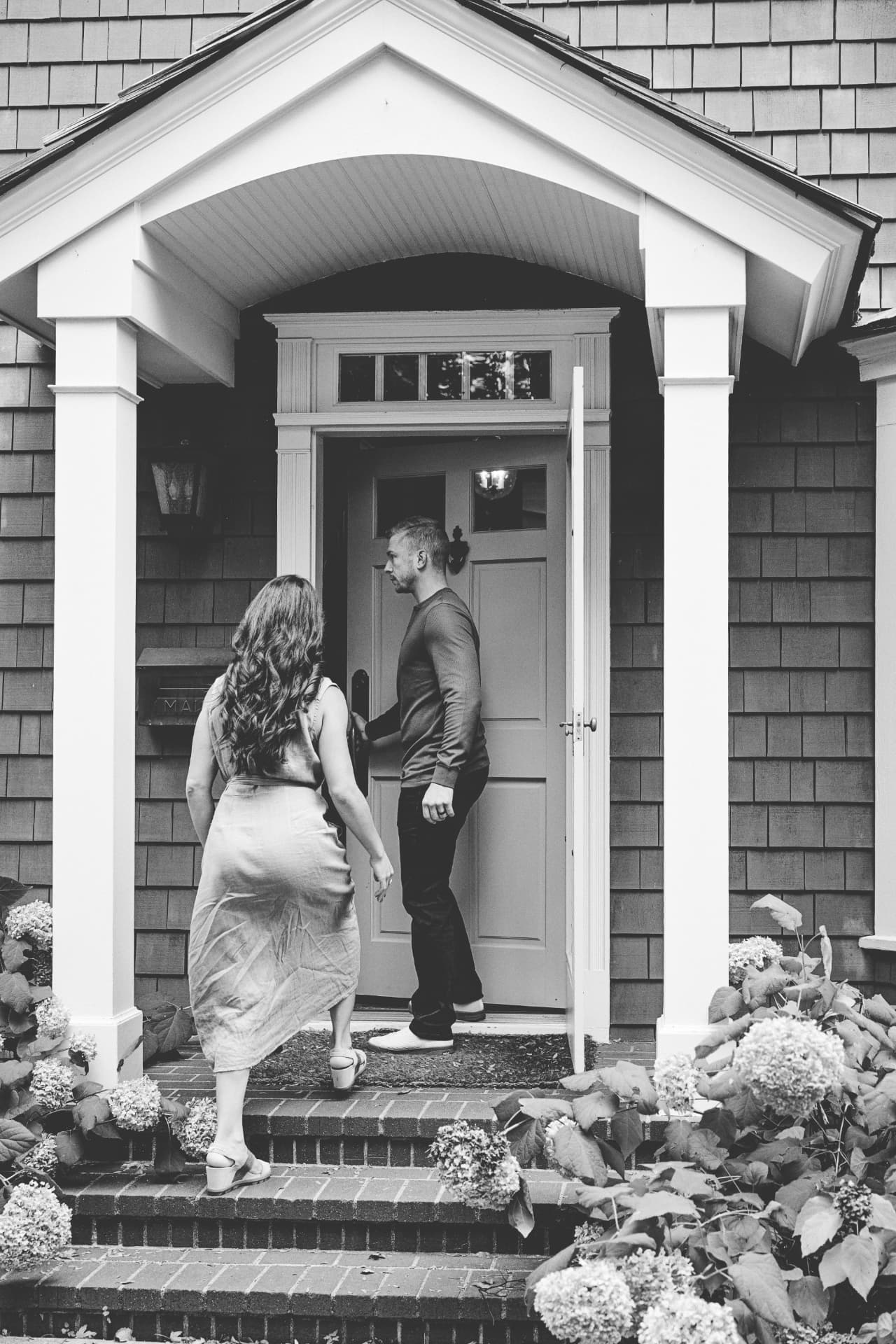CJ and Katy Norman reviewing a home together